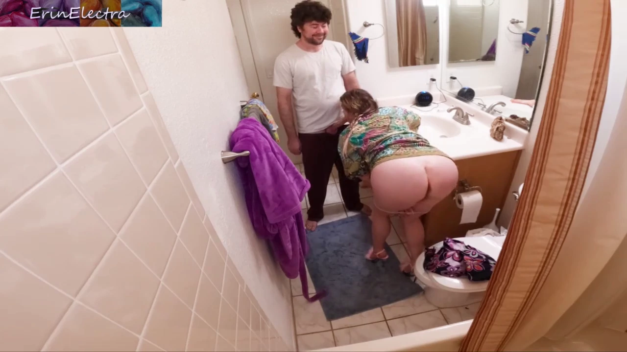 A taboo encounter unfolds as a busty housewife and her stepson engage in a steamy session in the bathroom. His throbbing desire meets her moist folds, culminating in a mind-blowing climax.